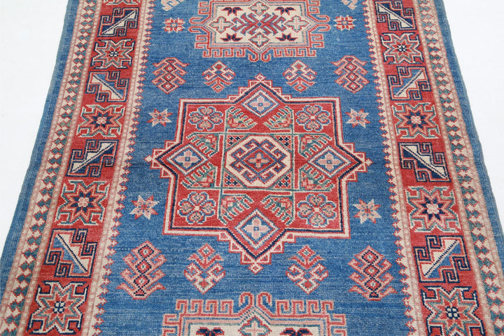 Kazak 3’ 11” x 6’ 0″ - No. AV75416 - ALRUG Rug Store
