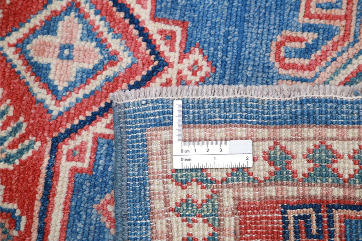 Kazak 3’ 11” x 6’ 0″ - No. AV75416 - ALRUG Rug Store