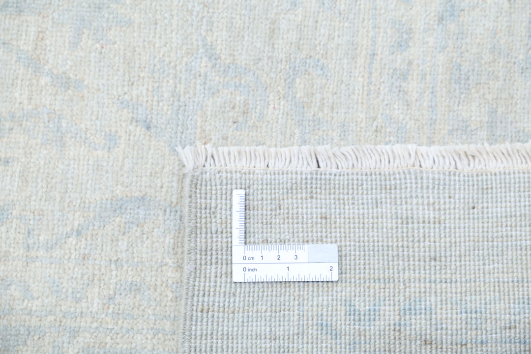 Ivory Pakistani Serenity Rug 12'2" x 18'4" Hand-Knotted field