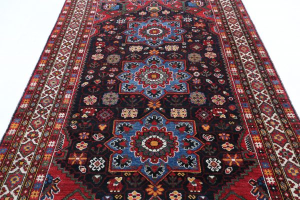 Black Baluch Oriental Rug 5'5" x 9'9" Hand-Knotted pattern