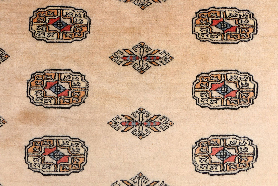 White Pakistani Bokhara Rug 4' 2 x 5' 7 Hand-Knotted close-up
