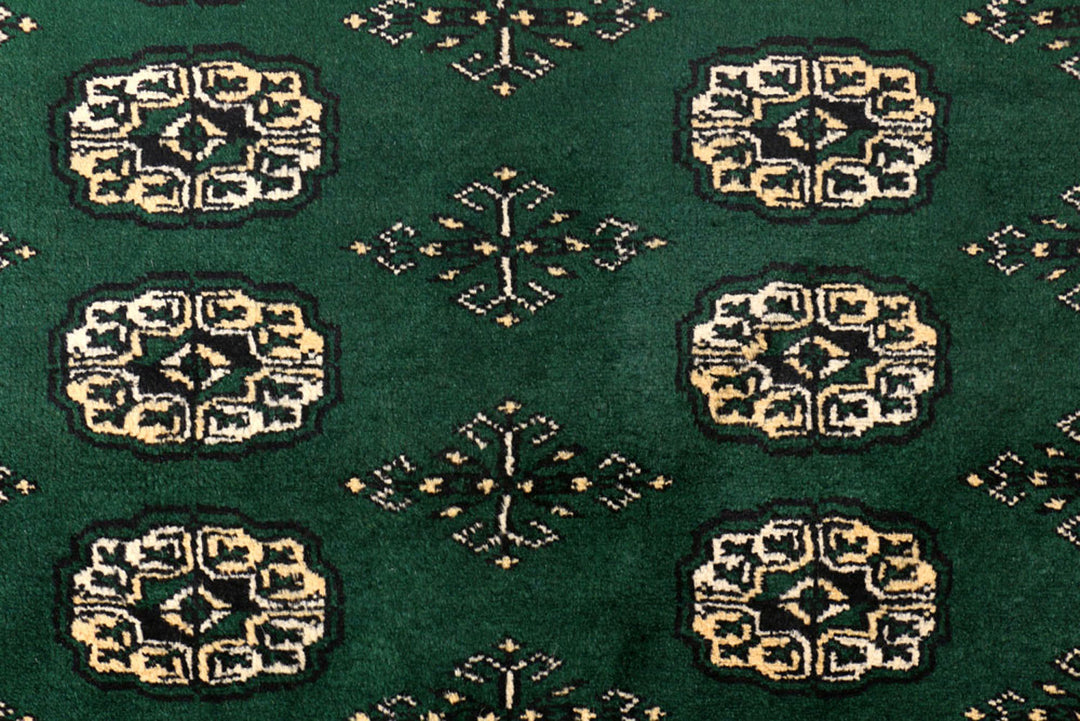 Green Pakistani Bokhara Rug 4' 2 x 6' Hand-Knotted close-up
