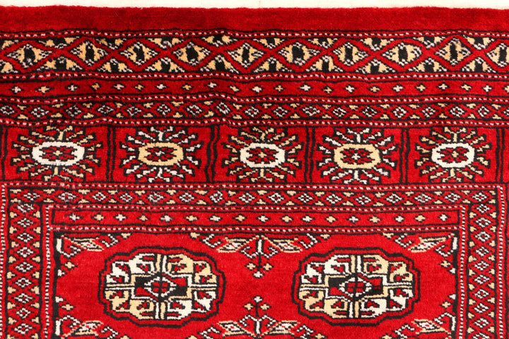 Red Bokhara 3' 2 x 4' 10 - No. 44144 - ALRUG Rug Store