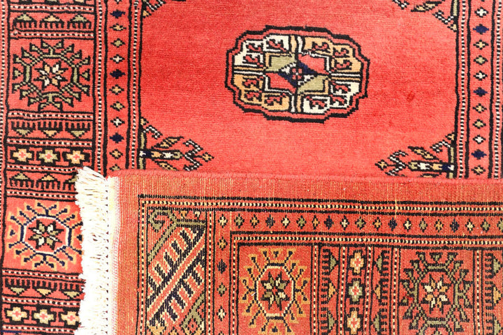 Salmon Bokhara 2' 7 x 10' 1 - No. 45574 - ALRUG Rug Store