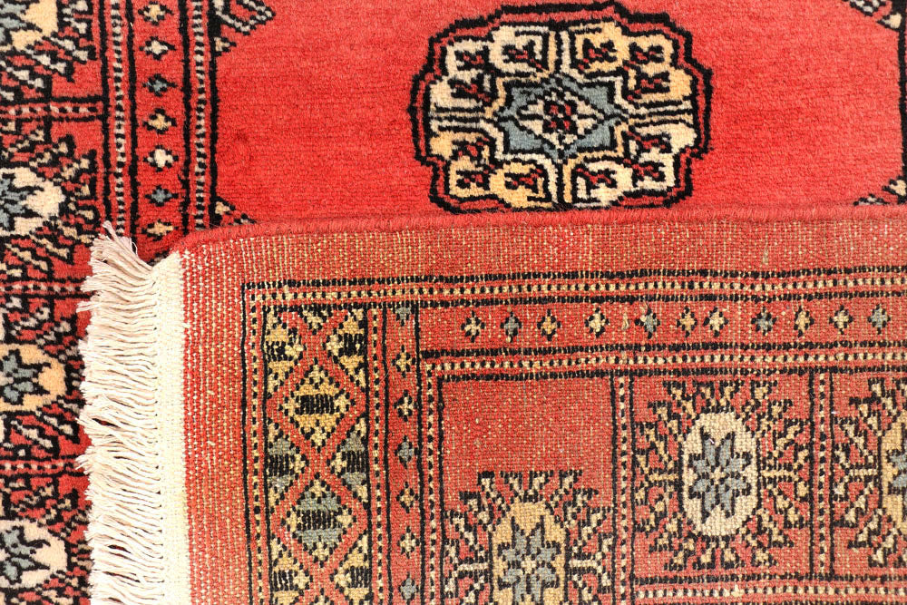 Salmon Bokhara 2' 6 x 11' - No. 45722 - ALRUG Rug Store