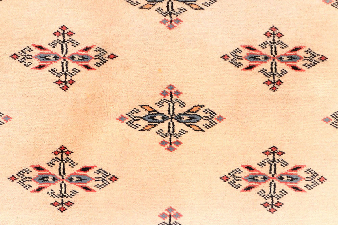 White Pakistani Bokhara Rug 4' 1 x 6' 2 Hand-Knotted close-up