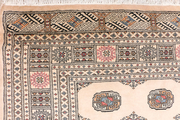 Tan Bokhara 6' 6 x 10' 5 - No. 46158 - ALRUG Rug Store