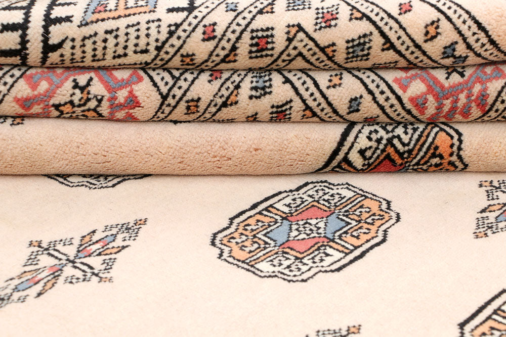 Tan Bokhara 6' 6 x 10' 5 - No. 46158 - ALRUG Rug Store