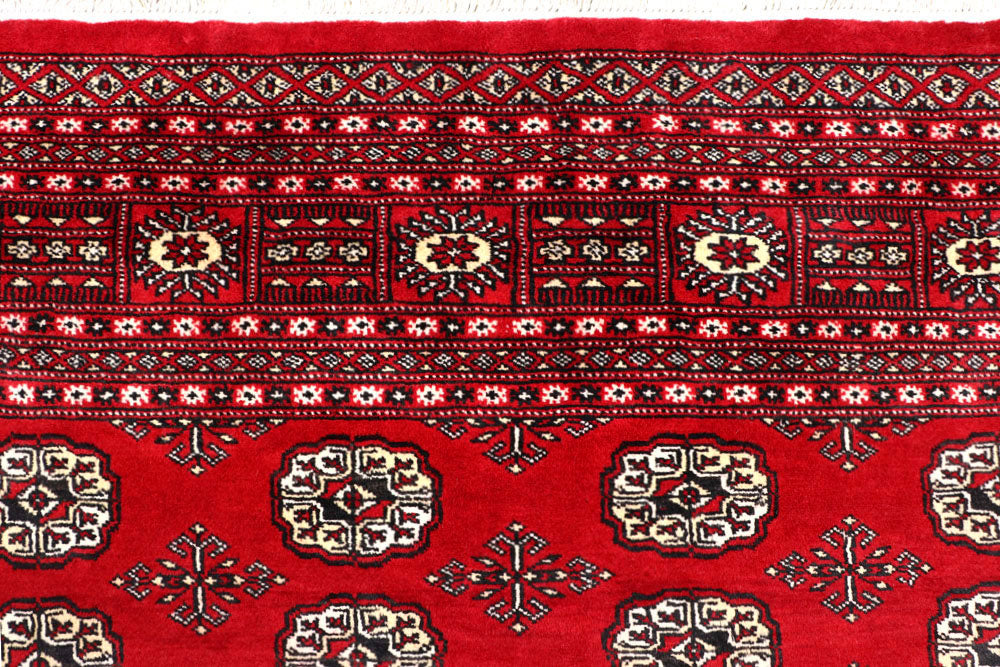 Red Bokhara 6' 6 x 10' 9 - No. 59214 - ALRUG Rug Store