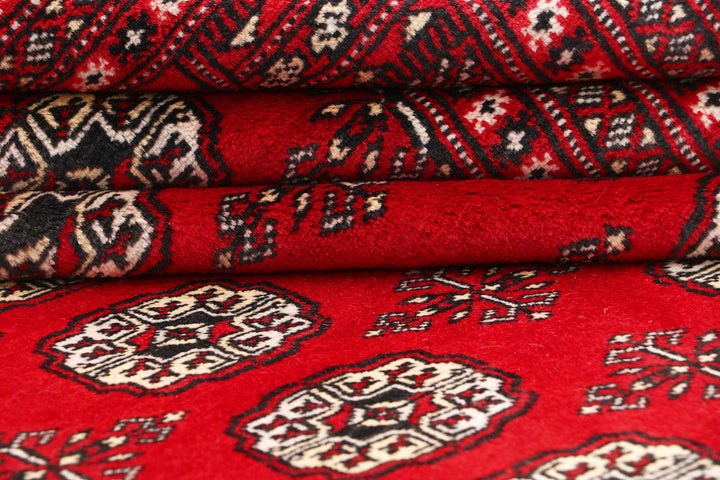 Red Bokhara 6' 6 x 10' 9 - No. 59214 - ALRUG Rug Store