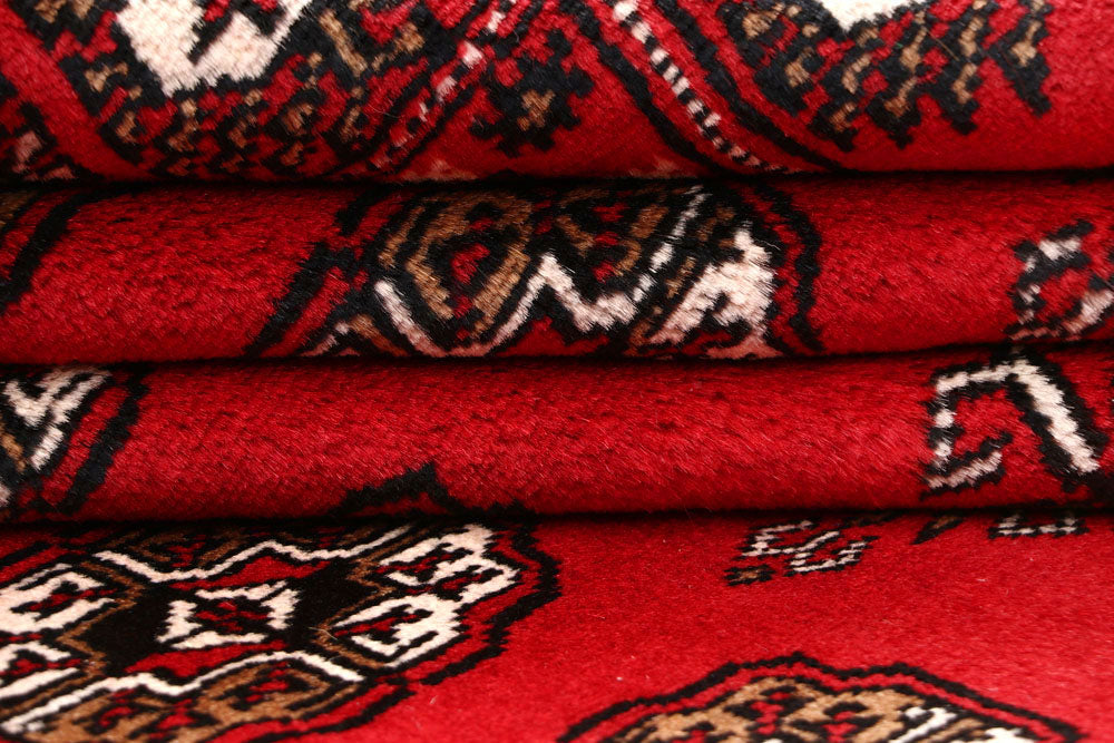 Red Bokhara 7' 1 x 10' 2 - No. 59237 - ALRUG Rug Store