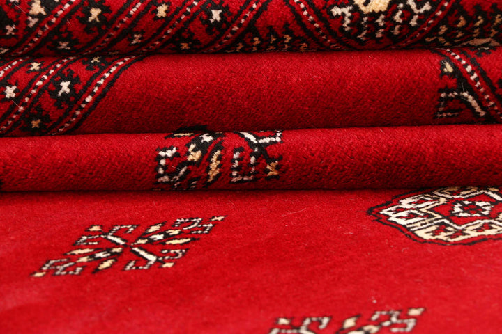 Red Bokhara 10' 1 x 14' 3 - No. 59590 - ALRUG Rug Store