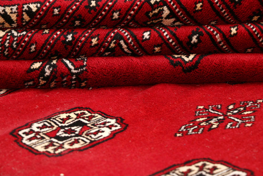 Red Bokhara 10' x 13' 1 - No. 59592 - ALRUG Rug Store