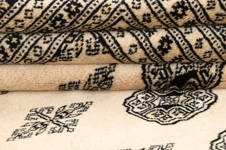 Blanched Almond Bokhara 6' 10 x 8' 6 - No. 59698 - ALRUG Rug Store