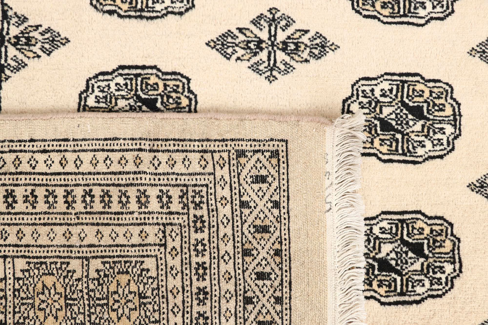 Blanched Almond Bokhara 6' 10 x 8' 6 - No. 59698 - ALRUG Rug Store