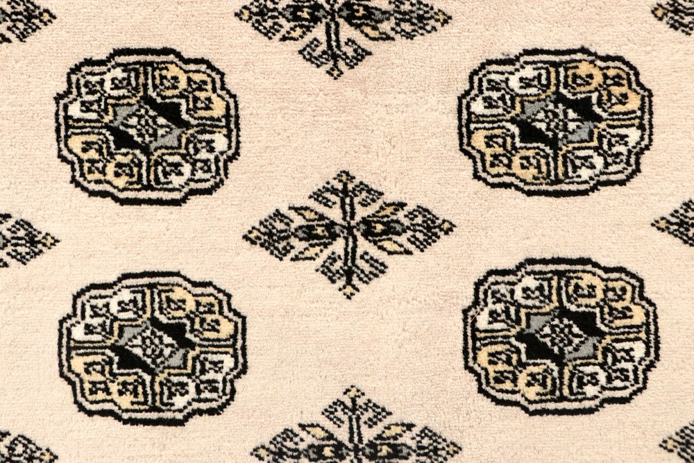 Blanched Almond Bokhara 6' 7 x 8' 10 - No. 59701 - ALRUG Rug Store