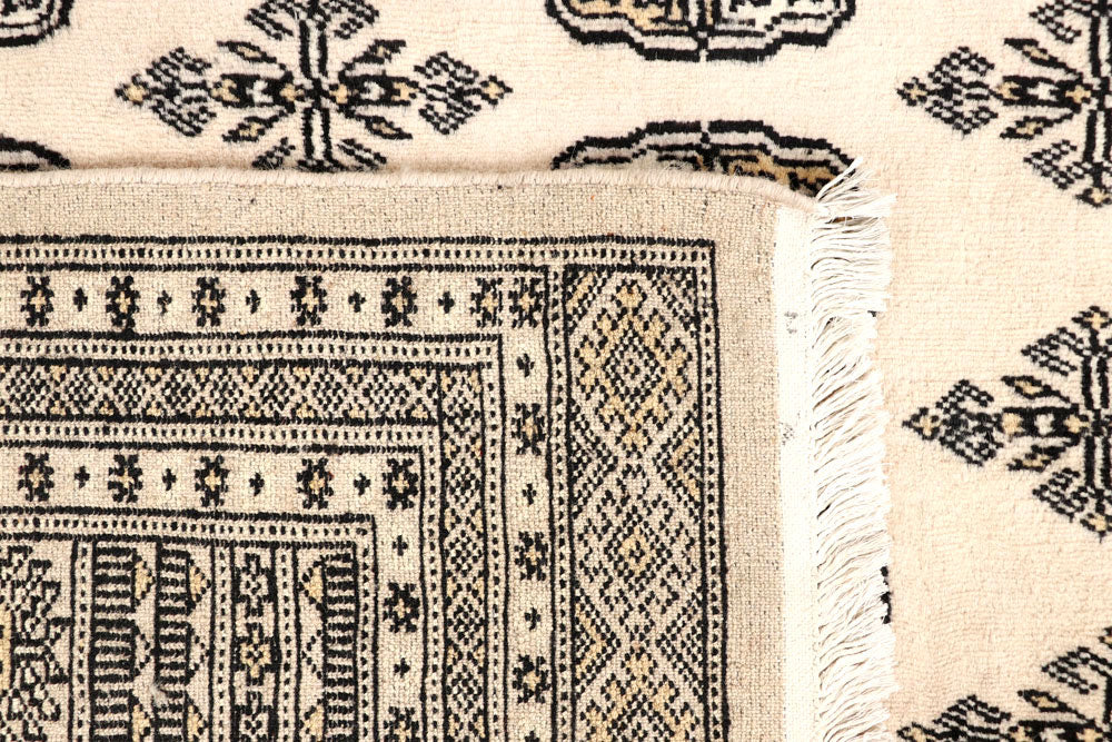 Blanched Almond Bokhara 6' 7 x 8' 6 - No. 59702 - ALRUG Rug Store