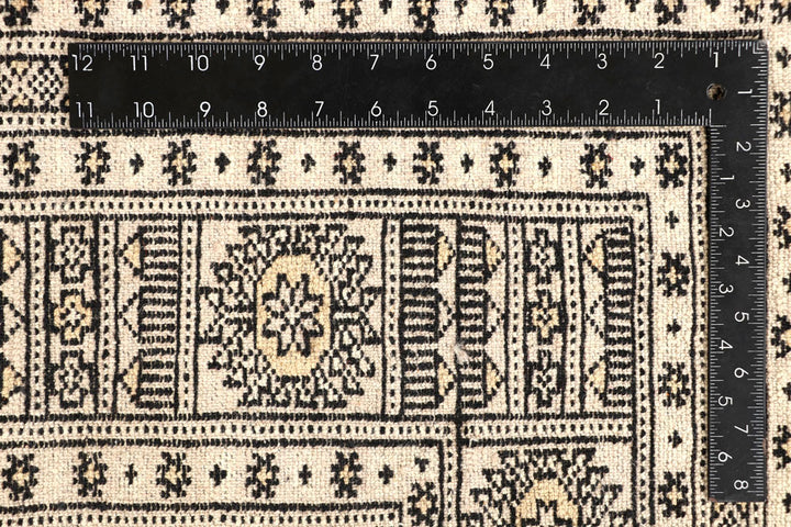 Blanched Almond Bokhara 6' 7 x 8' 6 - No. 59702 - ALRUG Rug Store
