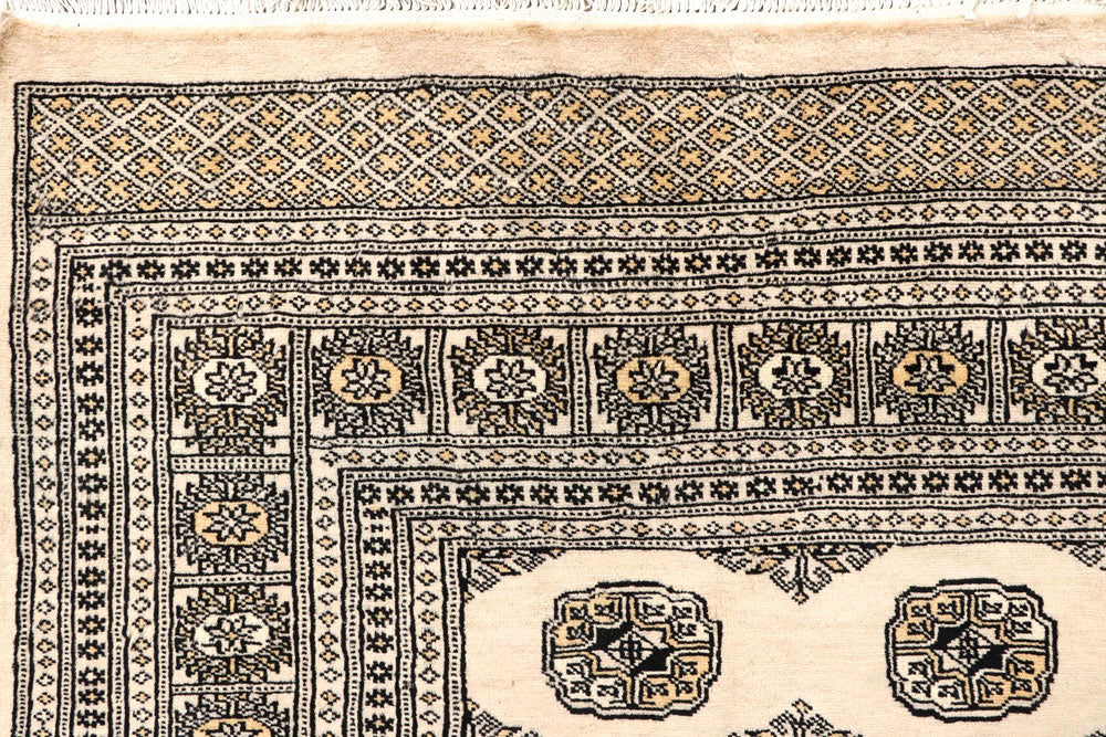 Blanched Almond Bokhara 6' 6 x 8' 2 - No. 59704 - ALRUG Rug Store