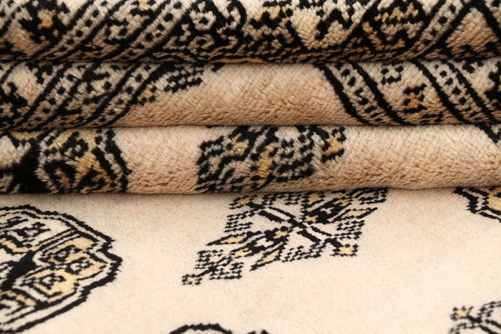 Blanched Almond Bokhara 6' 6 x 8' 2 - No. 59704 - ALRUG Rug Store