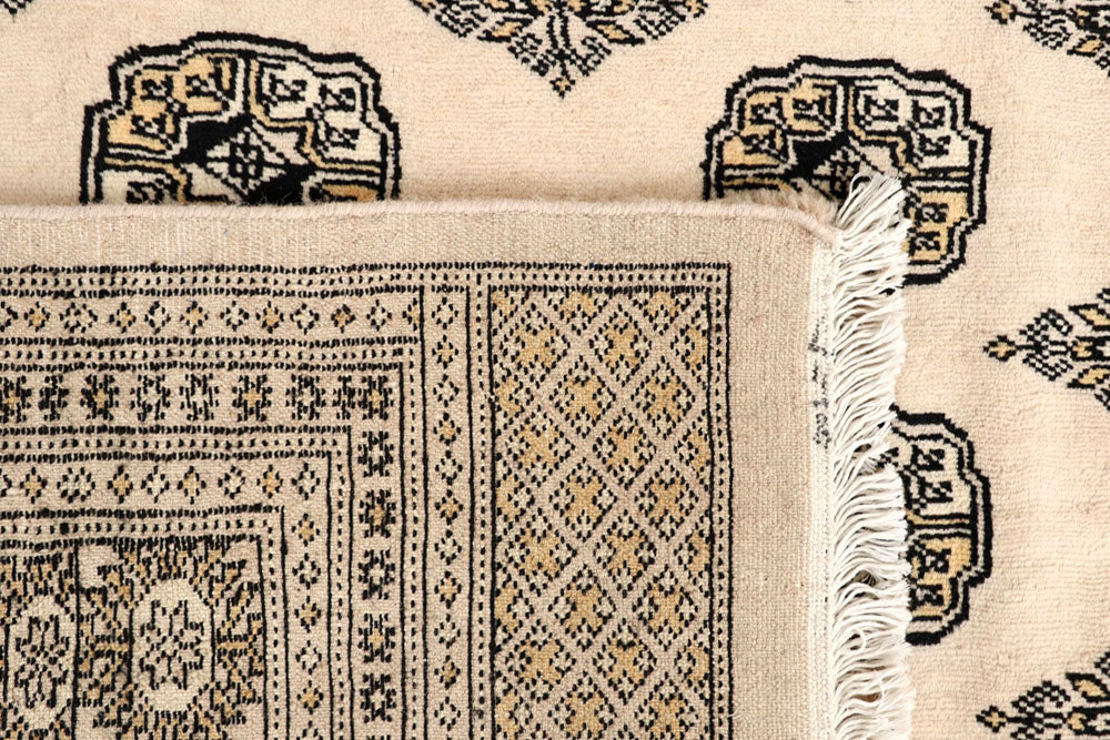 Blanched Almond Bokhara 6' 6 x 8' 2 - No. 59704 - ALRUG Rug Store