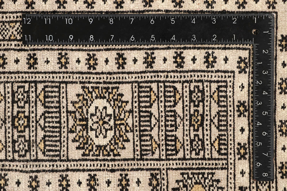 Bisque Bokhara 6' 7 x 8' 2 - No. 59717 - ALRUG Rug Store