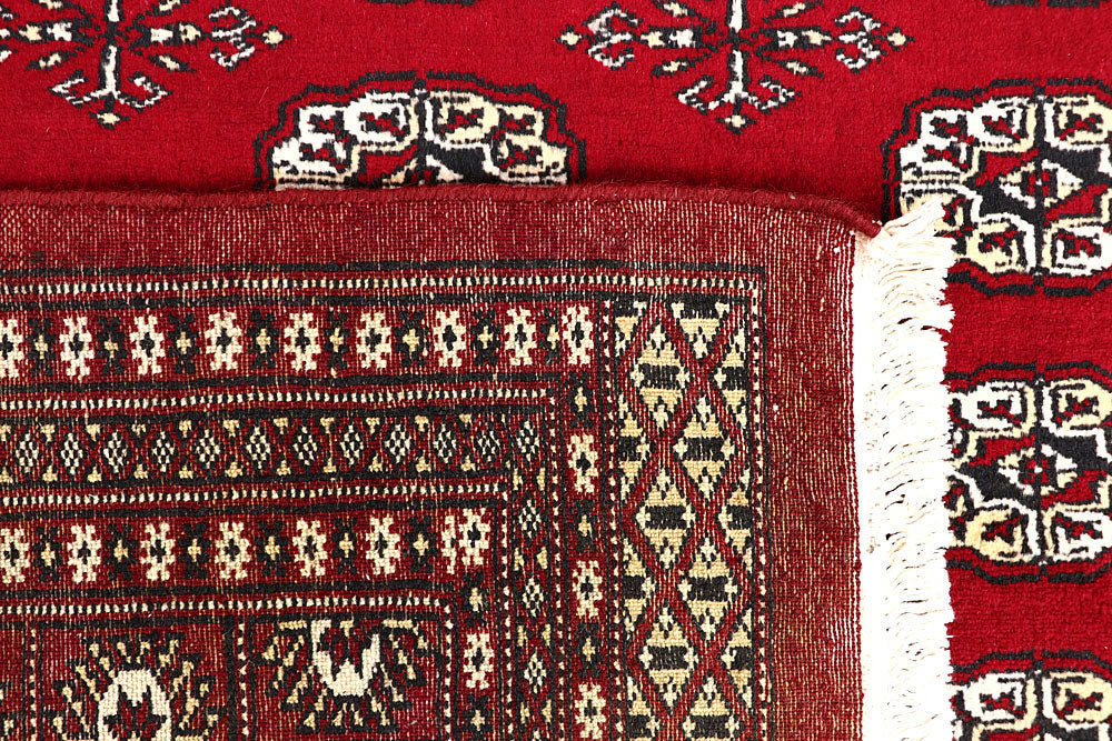 Red Bokhara 6' 2 x 8' 10 - No. 60133 - ALRUG Rug Store