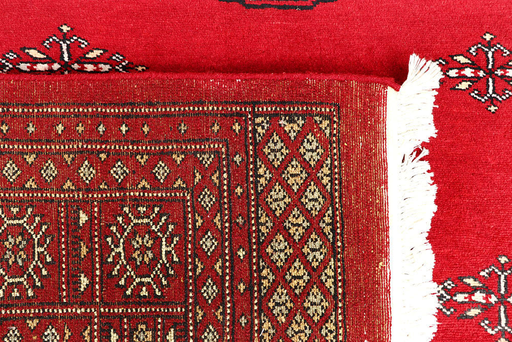 Red Bokhara 6' 3 x 9' 2 - No. 60138 - ALRUG Rug Store