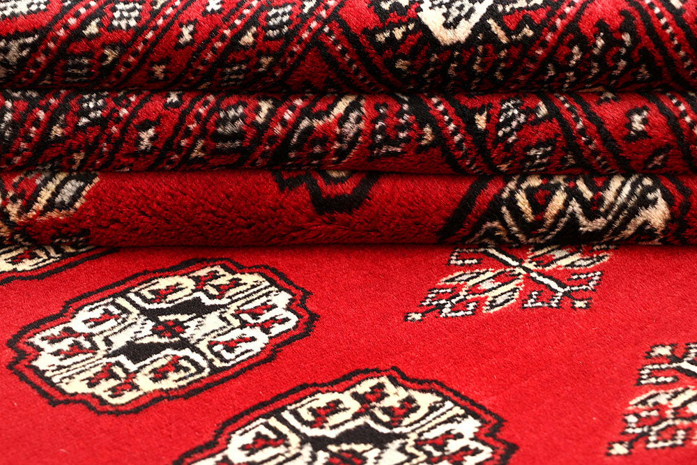 Red Bokhara 6' 4 x 9' 5 - No. 60141 - ALRUG Rug Store