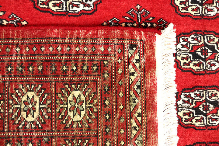 Red Bokhara 4' 11 x 8' 2 - No. 60327 - ALRUG Rug Store
