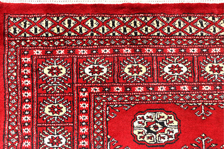 Firebrick Bokhara 5' 5 x 8' 4 - No. 60475 - ALRUG Rug Store