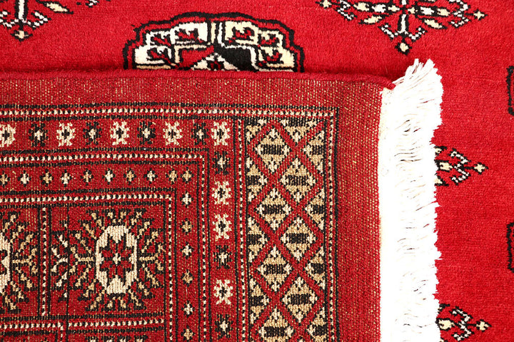 Red Bokhara 5' 5 x 8' 3 - No. 60580 - ALRUG Rug Store