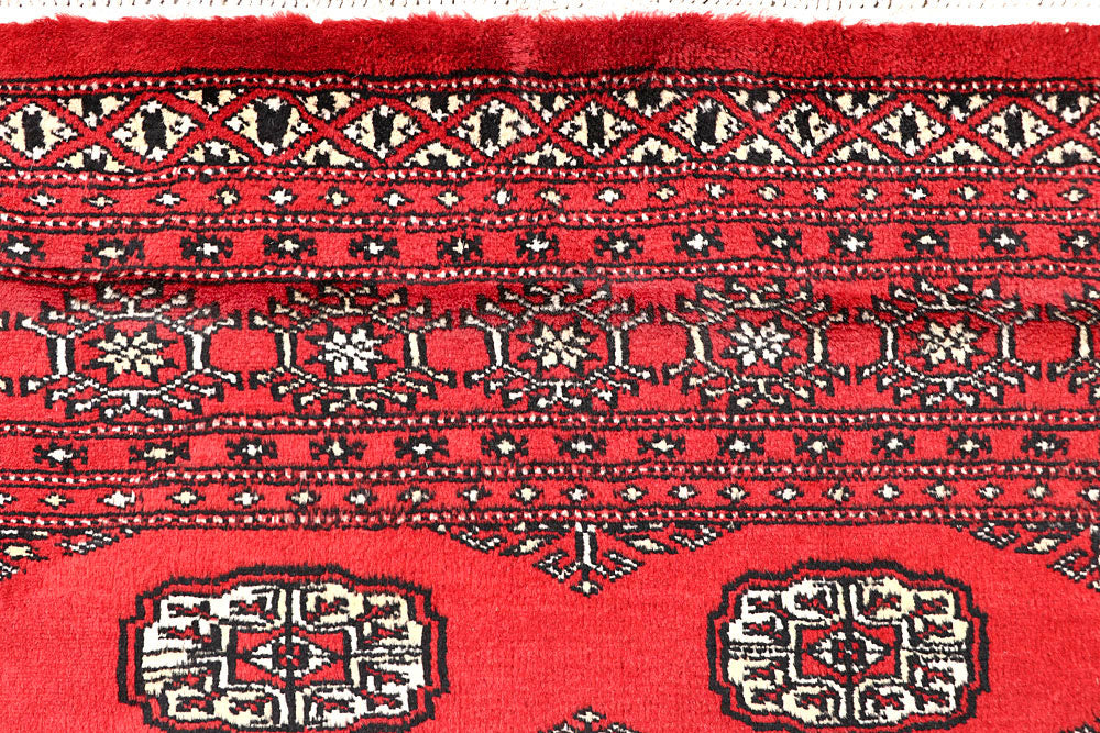 Red Bokhara 5' 5 x 8' 5 - No. 60584 - ALRUG Rug Store