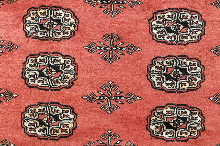 Salmon Bokhara 5' 6 x 8' 4 - No. 60626 - ALRUG Rug Store