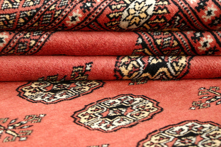 Salmon Bokhara 5' 6 x 8' 4 - No. 60626 - ALRUG Rug Store
