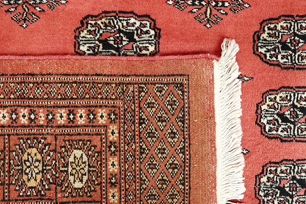 Salmon Bokhara 5' 6 x 8' 4 - No. 60626 - ALRUG Rug Store