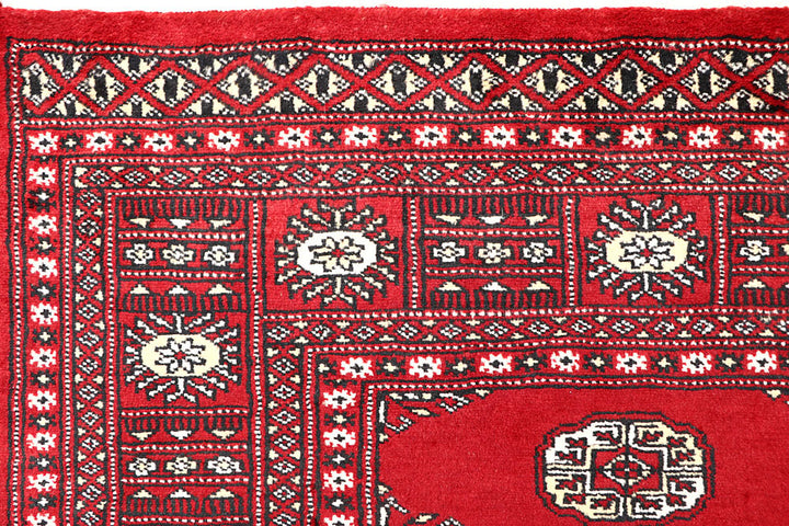Red Bokhara 4' 6 x 6' 5 - No. 60674 - ALRUG Rug Store