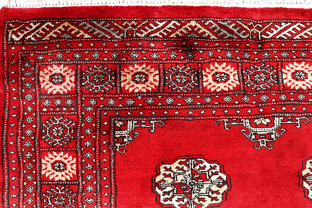 Firebrick Bokhara 4' 6 x 7' 1 - No. 60701 - ALRUG Rug Store