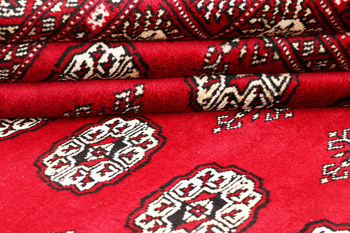 Red Bokhara 4' 6 x 7' - No. 60730 - ALRUG Rug Store