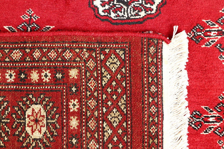 Red Bokhara 4' 5 x 7' 9 - No. 60752 - ALRUG Rug Store