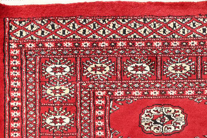 Red Bokhara 4' 2 x 6' 3 - No. 60934 - ALRUG Rug Store