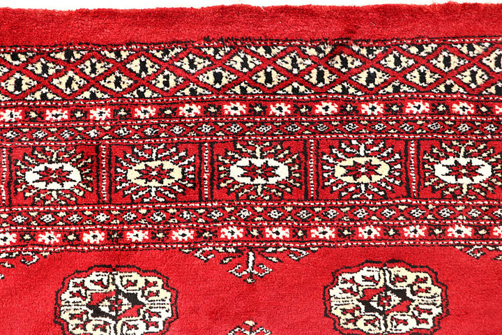 Red Bokhara 4' 2 x 6' 3 - No. 60934 - ALRUG Rug Store