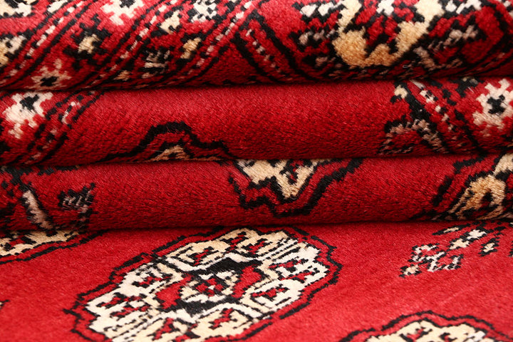 Red Bokhara 4' 2 x 6' 3 - No. 60934 - ALRUG Rug Store