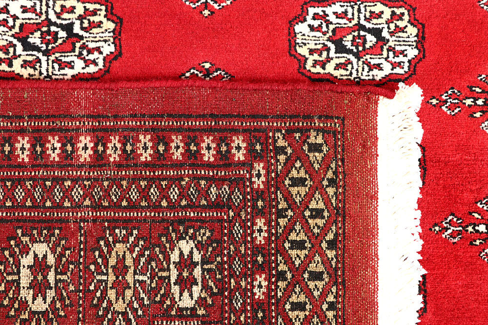Red Bokhara 4' 2 x 6' 3 - No. 60934 - ALRUG Rug Store