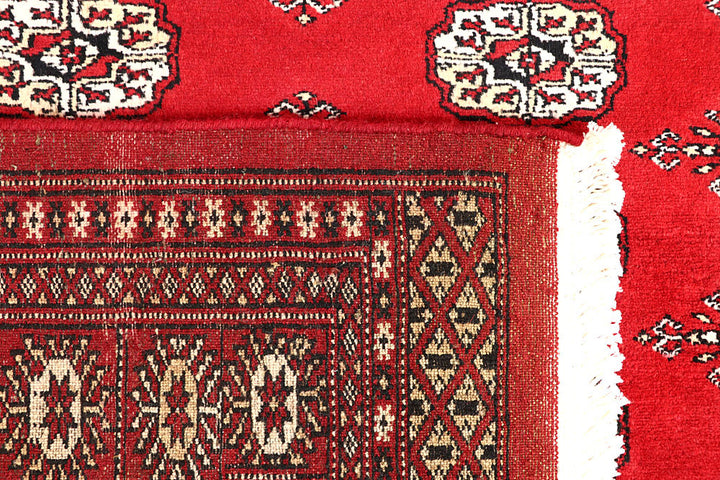 Red Bokhara 4' 2 x 6' 3 - No. 60934 - ALRUG Rug Store