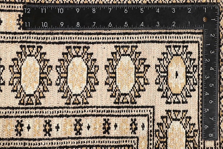Bisque Bokhara 4' 1 x 5' 11 - No. 61031 - ALRUG Rug Store