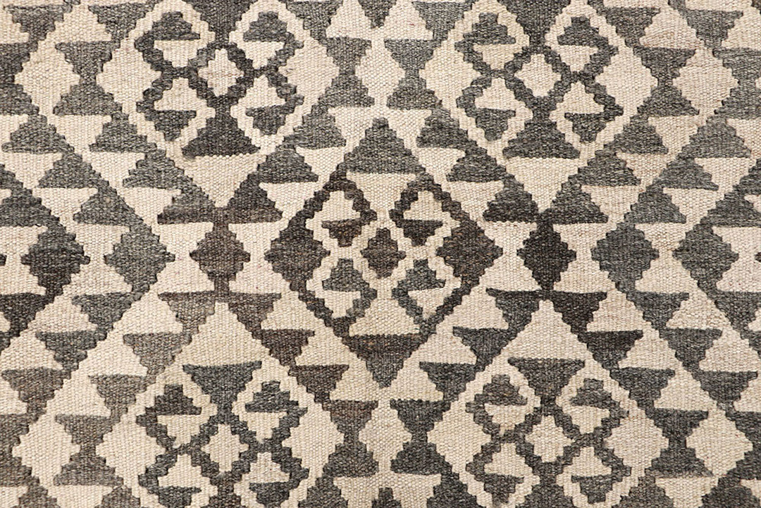 White Afghan Kilim Rug 4' 11" x 6' 4" Flat-Weave close-up