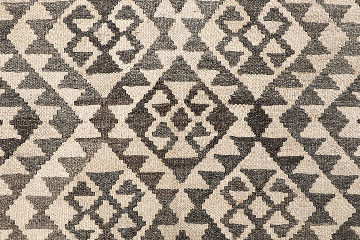 White Afghan Kilim Rug 4' 11" x 6' 4" Flat-Weave close-up