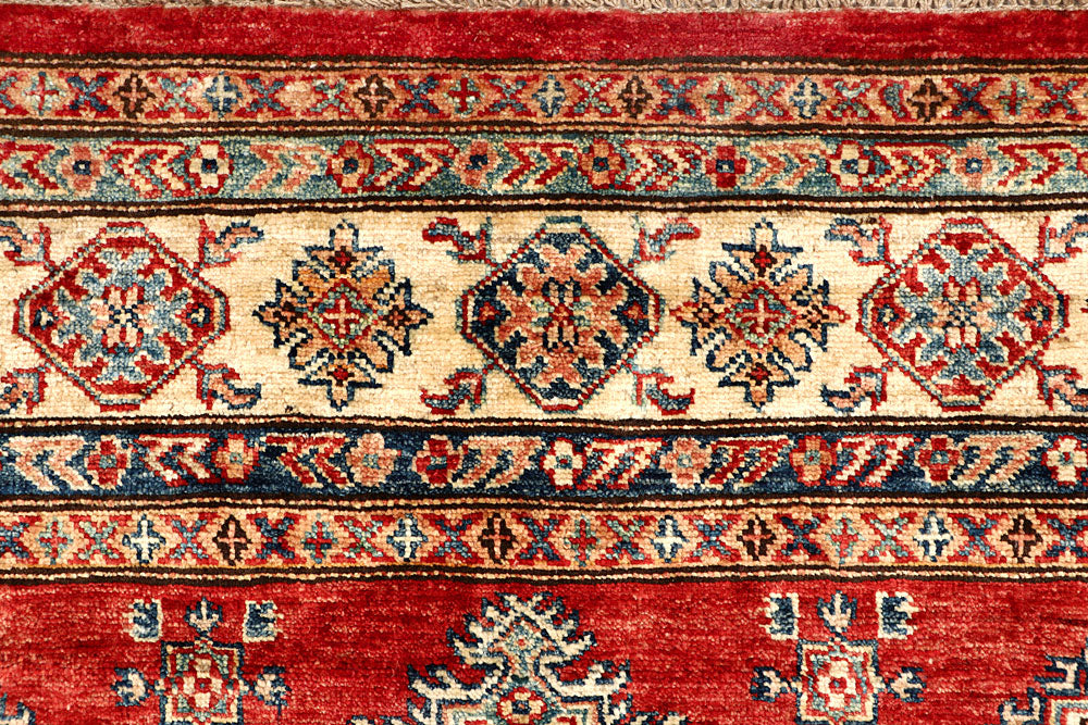 Firebrick Kazak 4' 11 x 6' 8 - No. 64953 - ALRUG Rug Store