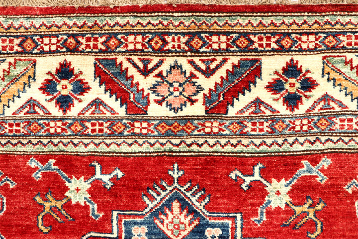 Firebrick Kazak 5' 1 x 7' 3 - No. 64965 - ALRUG Rug Store